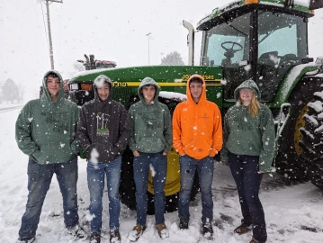Winnebago High School students (from left to right) Josh Cowman, Matthew Stahl, Mason Heslop, Jason Gates and Madi Palm-Graceffa braved a spring snowstorm to take part in "Drive Your Tractor to School Day." While student FFA membership is up, the average age of farmers in the U.S. is on the rise.