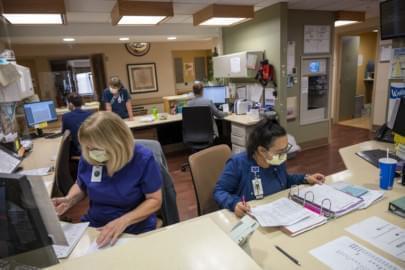 Staff work at a recovery unit at UnityPoint's Methodist hospital in Des Moines. The unit receives many COVID-19 patients recovering from the virus.
