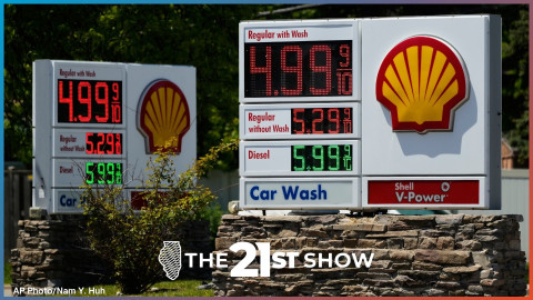 Gas prices are displayed at a gas station in Morton Grove, Ill, Thursday, May 14, 2026.