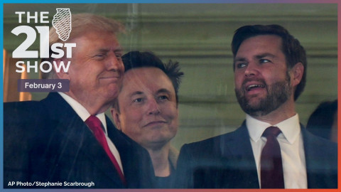 In this picture taken through a window, President-elect Donald Trump, from left, Trump's pick for the planned Department of Government Efficiency Elon Musk and Vice President-elect JD Vance attend the NCAA college football game between Army and Navy at Northwest Stadium in Landover, Md., Saturday, Dec. 14, 2024.