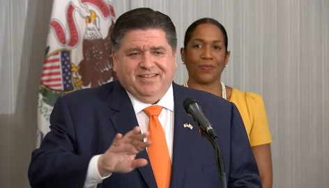  Gov. JB Pritzker takes questions Wednesday for the first time after having been elected to a second term. In the photo, he is brushing off a question about 2024 presidential aspirations. 