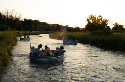 A group floats down the Middle Loup River in Nebraska in livestock water tanks. The state is promoting what locals call "tanking," in an attempt to attract tourists. States like Iowa, Kansas and Nebraska lean on unique sites and activities to overcome “flyover” perceptions. 