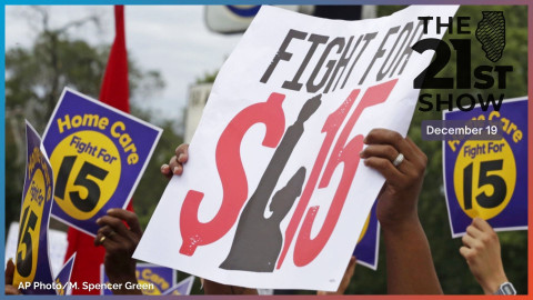 In this Sept. 14, 2014, file photo, protesters participate in a rally on Chicago's south side as labor organizers escalate their campaign raise the minimum wage for employees to $15 an hour.