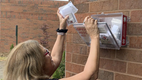 Karen Warpenburg, executive director of the Evansville Recovery Alliance, refills an overdose reversal kit in Evansville, Indiana. 