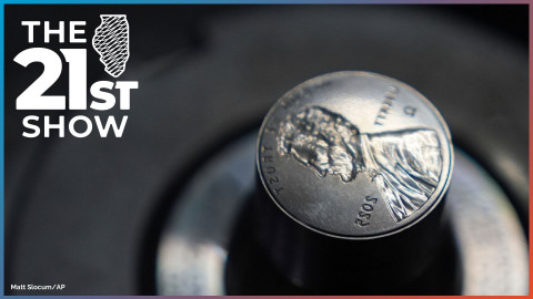 A die for a penny press is seen at the U.S. Mint in Philadelphia in November 2025. In addition to the usual markings, this one also includes an omega mark — Ω, the last letter in the Greek alphabet — used for the last pennies ever minted.