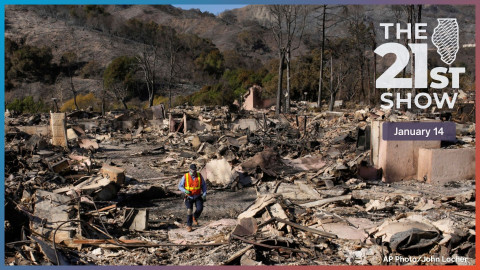 A worker surveys the damage from the Palisades Fire in the Pacific Palisades neighborhood of Los Angeles, Monday, Jan. 13, 2025.