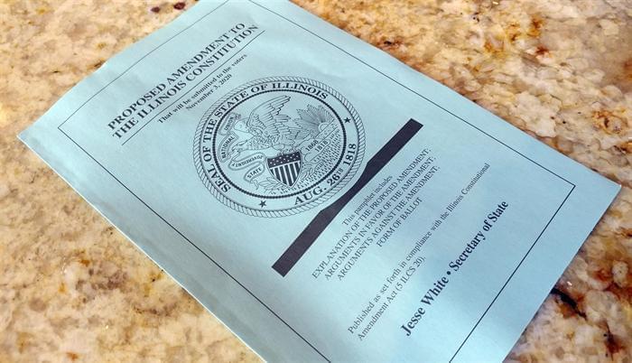 Pictured is a voter pamphlet distributed to Illinois households by Secretary of State Jesse White's office regarding the graduated income tax constitutional amendment.