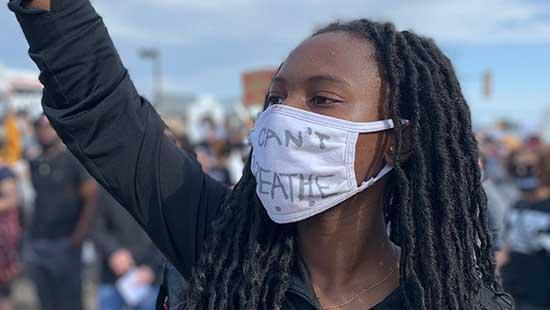 Kia Southerland participates in the Champaign Black Lives Matter protest in June 2020